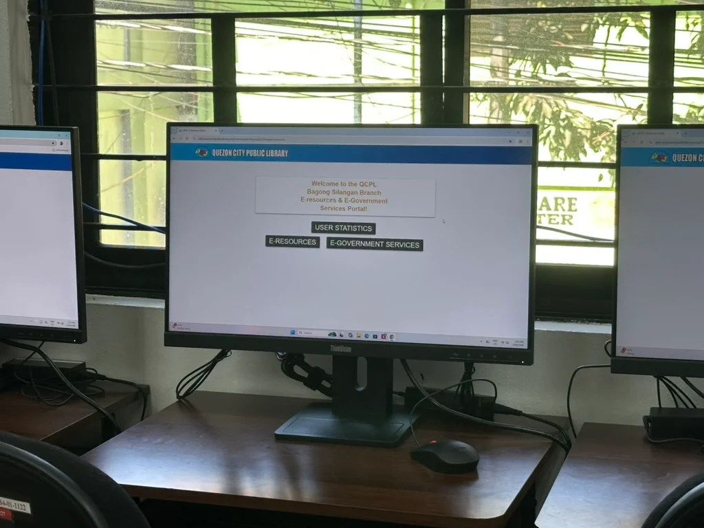 Computers at the Quezon City Public Library’s Bagong Silangan branch displaying its e-resources and e-government services portal.